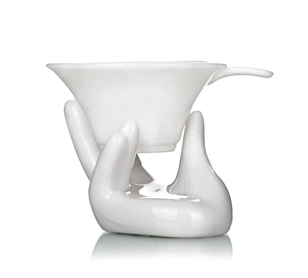 Hand-shaped porcelain tea strainer